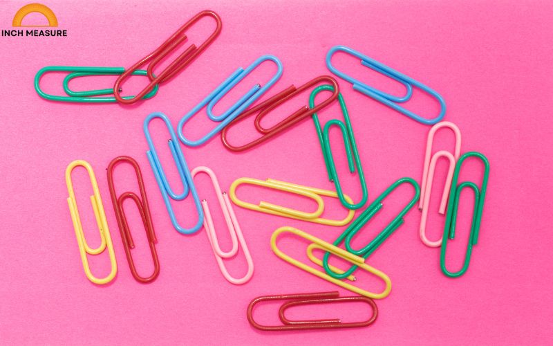 Paperclips are ubiquitous in offices and homes, used to hold sheets of paper together. When straightened, a standard large paperclip measures about 4 cm in length. This makes it an excellent reference for visualizing 4 cm.