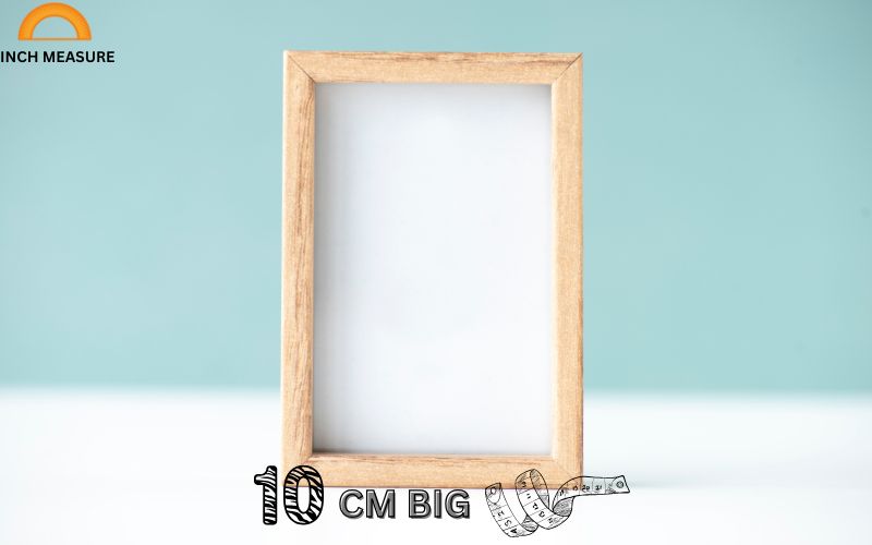 A small picture frame, such as one designed for a 4x6 inch photo, often has a width or height close to 10 cm. 