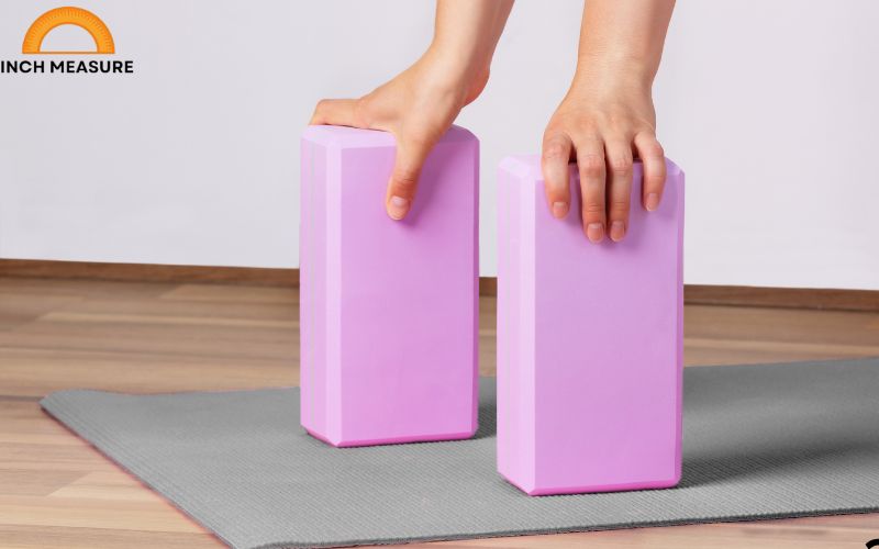 A standard yoga block, used for support in poses, typically measures about 30 cm in length.