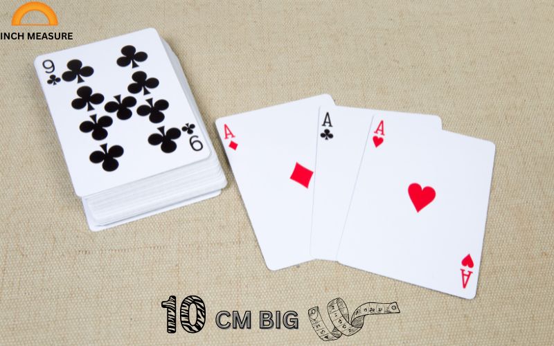 A standard deck of playing cards, when stacked, is often close to 10 cm in length.