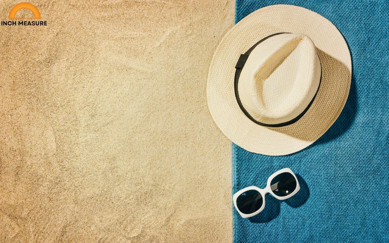 A Beach Towel is about 18 inches wide when rolled up.
