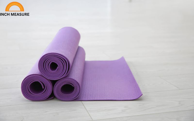 When rolled up, a standard yoga mat often measures around 20 inches in length.